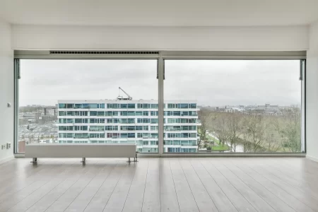 empty-room-with-laminate-flooring-french-windows